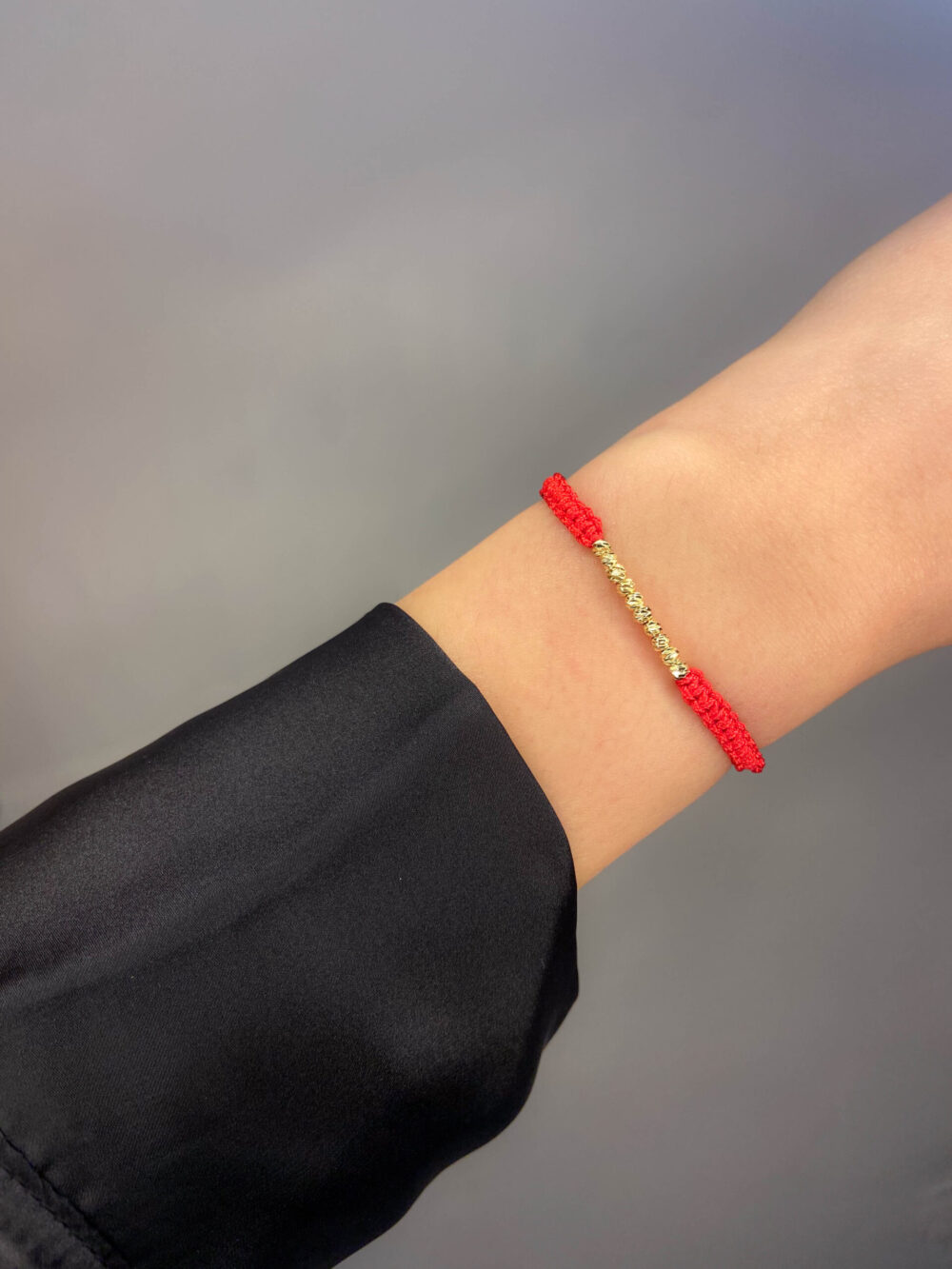 Bracelet cordon boules rouge